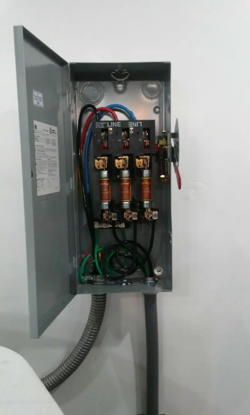 Three-phase disconnect switch installed for Smoke Detector Installation in Granby